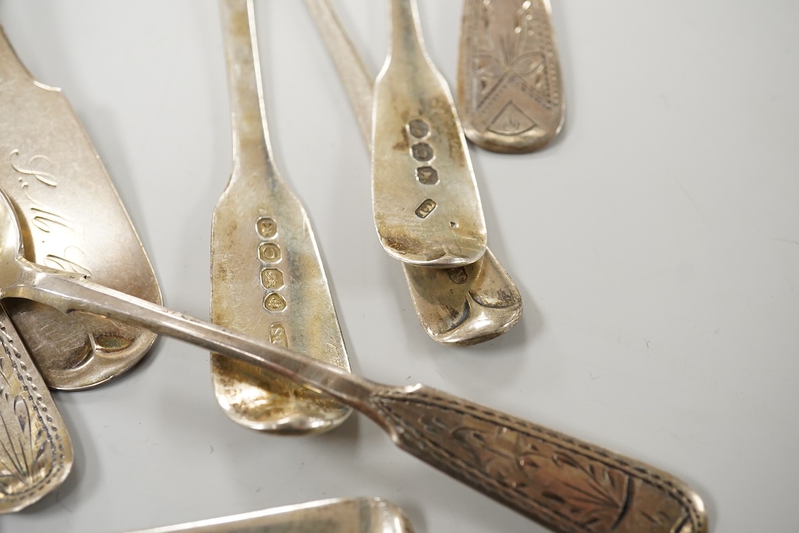 A small quantity of assorted mainly 19th century silver flatware including table spoons and teaspoons, various dates, patterns and makers, together with a silver crumb scoop(lacking handle), five 19th century Russian 94